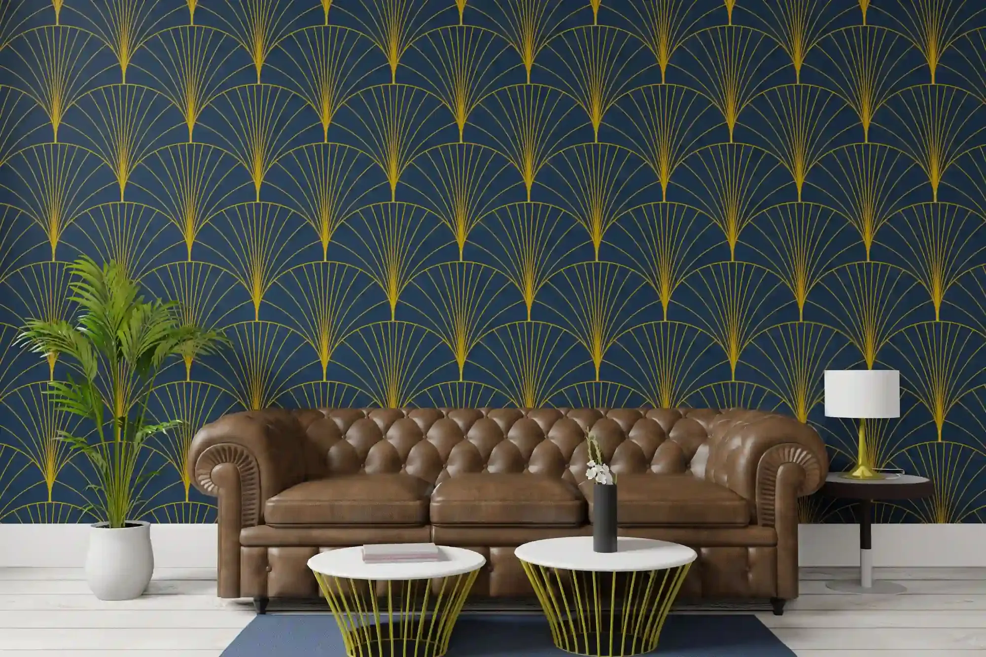 Navy Art Deco fan wallpaper with fine gold lines behind a tan leather sofa